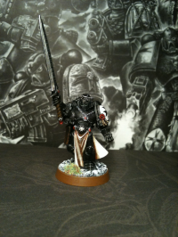 Bruder Dietrich, Chamion des Imperators des Space Marine Ordens der Black Templars. Space Marines der Black Templars gehören zu einem Nachfolgeorden der Imperial Fists. Während der Belagerung des Imperialen Palastes wurde Sigismund als Edelster der Imperial Fists zum Champion des Imperators erwählt. Er wurde mit der besten verfügbaren Ausrüstung, darunter dem Schwarzen Schwert und der Rüstung des Glaubens, ausgestattet, um Champions der dunklen Götter zu erschlagen. Am Ende der Belagerung waren 24 von diesen durch Sigismund ihrer gerechten Strafe zugeführt worden.