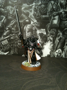 Bruder Dietrich, Chamion des Imperators des Space Marine Ordens der Black Templars. Space Marines der Black Templars gehören zu einem Nachfolgeorden der Imperial Fists.  Während der Belagerung des Imperialen Palastes wurde Sigismund als Edelster der Imperial Fists zum Champion des Imperators erwählt. Er wurde mit der besten verfügbaren Ausrüstung, darunter dem Schwarzen Schwert und der Rüstung des Glaubens, ausgestattet, um Champions der dunklen Götter zu erschlagen. Am Ende der Belagerung waren 24 von diesen durch Sigismund ihrer gerechten Strafe zugeführt worden.